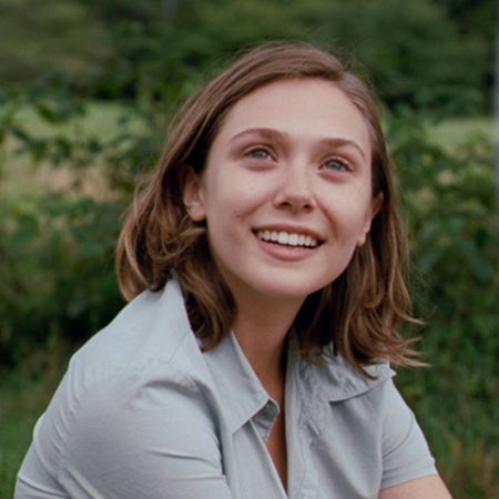 Elizabeth Olsen as Marth smiling at someone